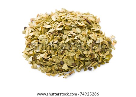 dried leaves of mate tea on white background