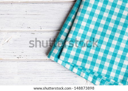 Checkered Napkin On Wooden Table