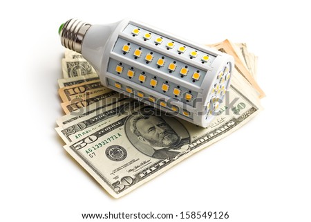 LED lightbulb with us dollars on white background