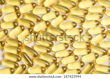 Cod liver oil. Gel capsules background