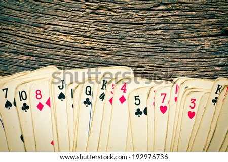the old cards on wooden table