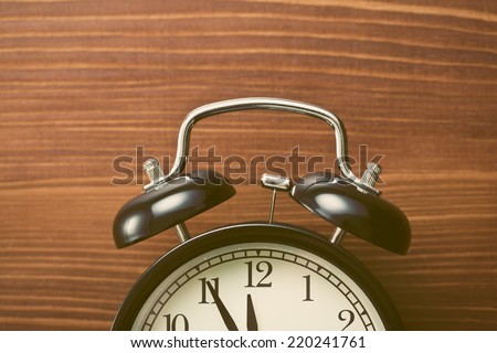 the closeup of analog retro alarm clock