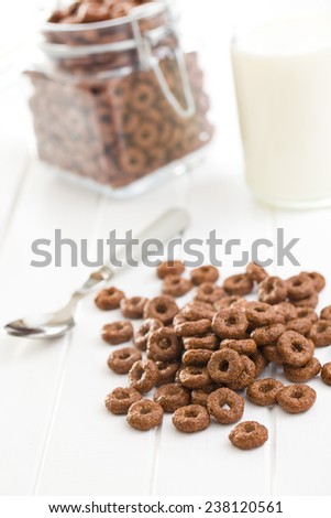 chocolate cereal rings on white table