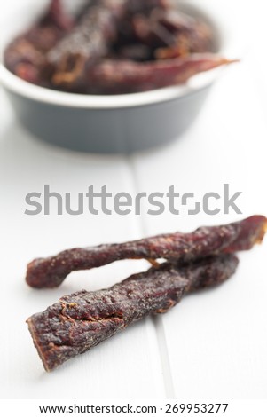 spice beef jerky on white table