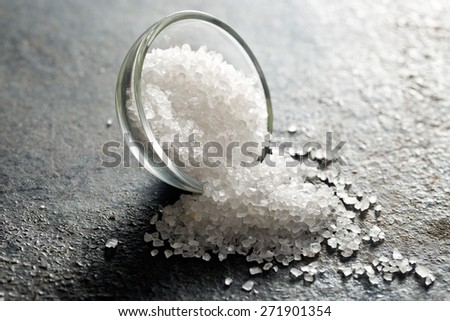 white salt on black kitchen table