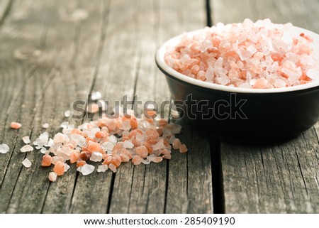 Himalayan salt on old wooden table