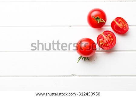 chopped tomatoes  on kitchen table