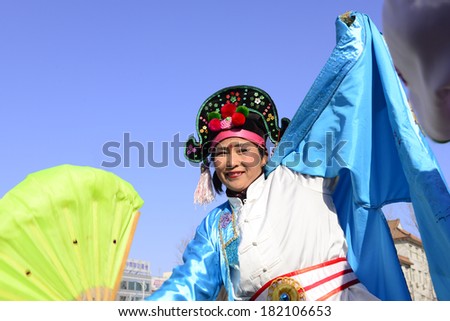 LUANNAN county - Feb. 9: people wearing colorful clothes to yangko dance performances in square, on February 9, 2014, LUANNAN county, hebei province, China.