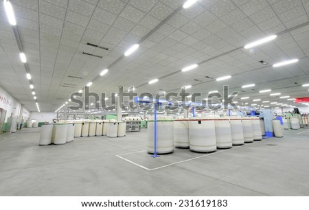 LUANNAN county - April 7: a spacious spinning workshop is work in the factory, ZeAo spinning co., LTD., on April 7, 2014, LUANNAN county, hebei province, China.