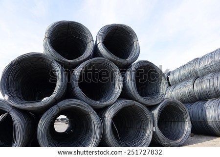 Many rolled steel pile up together, close-up