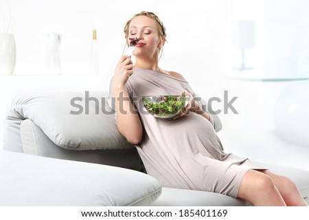 Nutrition in pregnancy .Young mom takes care of a healthy diet for yourself and your unborn child