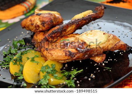 Chicken Wings. Serving grilled poultry meat served on white ceramic plate