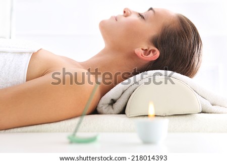 Aromatherapy, medicine east, natural medicine .Attractive brunette woman in spa salon