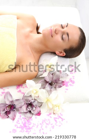Attractive woman resting in a massage parlor.Woman relaxes in a beauty salon.