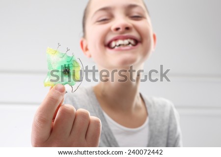 Child with orthodontic appliance.Portrait of a little girl with orthodontic appliance