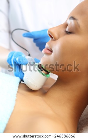 Ultrasound, a woman in the beauty salon.The woman\'s face during a facial at a beauty salon