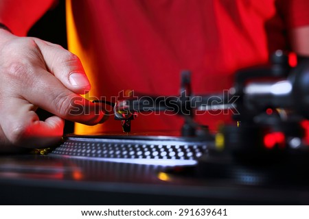 DJ, dance and rhythm. Hands DJ mixing music at the club during the event