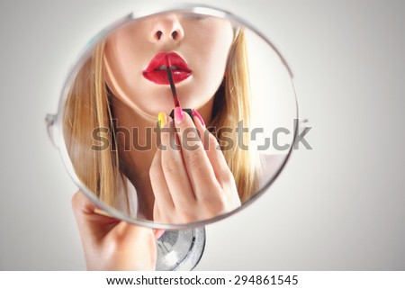 Make up. Beautiful female lips painted red lipstick
