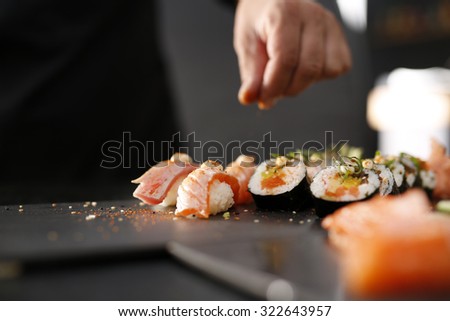 Japanese restaurant, sushi. Classic Japanese sushi served on a stone plate