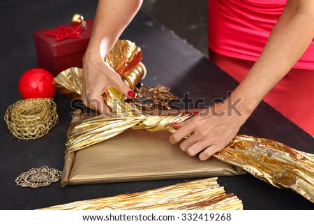 Things you need to pack gifts.Woman packs gifts, step by step