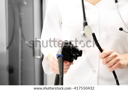 Hospital ward, gastroenterologist preparing the study. Doctor gastroenterologist with probe to perform gastroscopy and colonoscopy