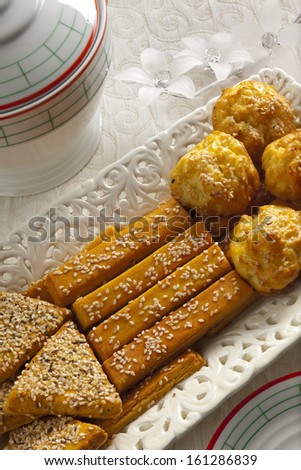 sesame sticks, triangles and balls on plate