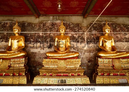 three beautiful golden statues buddha sign of religion