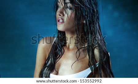 Beautiful young model with long wet hair, light makeup. Fresh summer look with damp beach hairstyle.