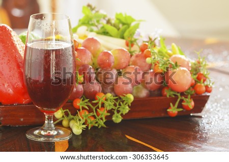 fresh red grape juice and red grape and vegetables