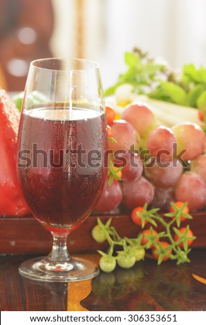 fresh red grape juice and red grape and vegetables
