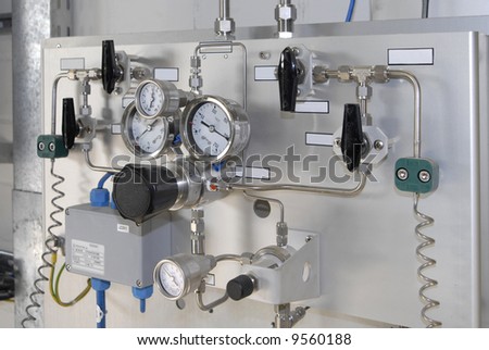 pressure gauges and control panel at a natural gas purification plant