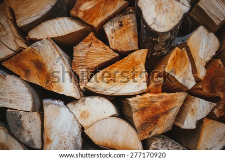 Firewood with mountains in the background