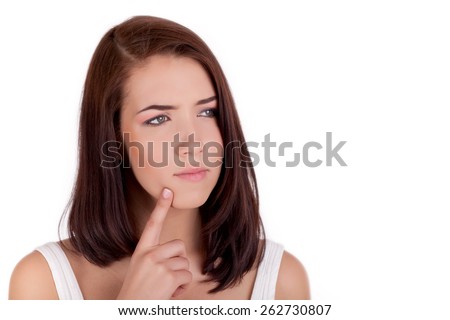 curious woman finger on chin