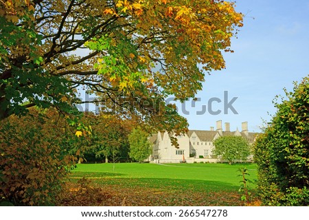 An Autumn view of a Cotswold country Mansion and gardens near to Painswick, Gloucestershire, United Kingdom