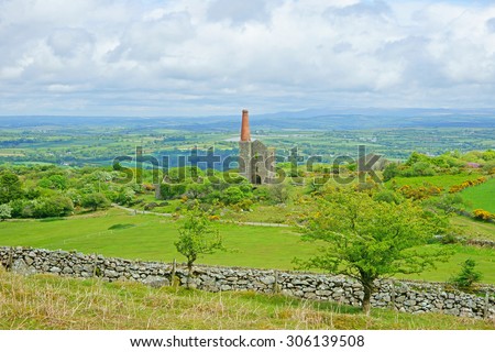 Panorama view of Bodmin Moor, the ruins of a Cornish Tin Mine, the Phoenix United Mines Prince of Wales Engine House can be seen in the distance, at Minions on Bodmin Moor in Cornwall, United Kingdom