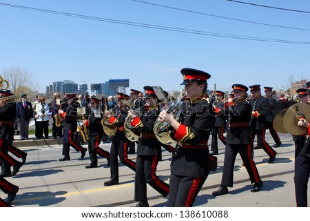 TORONTO, CANADA - APRIL 27: Marching band in the military parade in Toronto that marks the 200th anniversary of the Battle of York on April 27, 2013 - Toronto, Ontario, Canada.