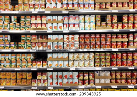 TORONTO, CANADA - MAY 06, 2014: Canned food products in a supermarket. Canned foods consumption has declined in North America as the economy improves and consumers spending more on fresher food items.