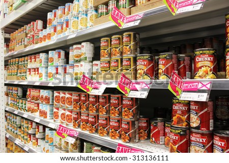 TORONTO, CANADA - AUGUST 19, 2014: Canned food products on shelves in a supermarket in Toronto, Ontario, Canada.