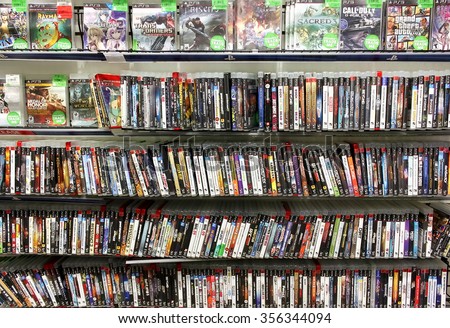 TORONTO, CANADA - DECEMBER 24, 2014: Video games on display in a game store in Toronto, Ontario, Canada.