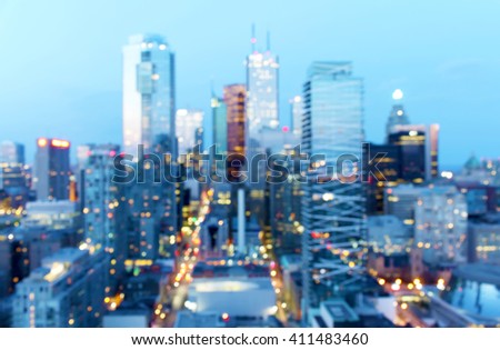 Abstract defocused city dusk background with bokeh lights, Toronto, Canada