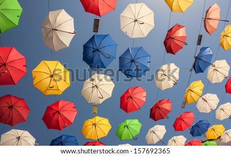 Multicolored umbrellas against the blue sky. Canon 5D Mk II.