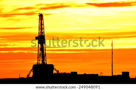 Drilling rig during the sunset
