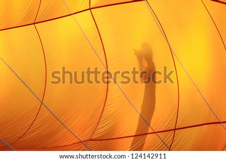 Shadow of photographer Behind Hot Air Balloon