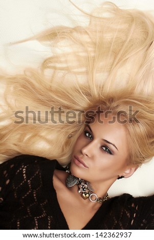 Beautiful sexy passion blond woman. white background