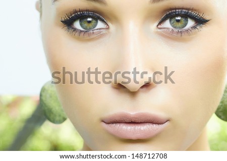 Beautiful blond woman. green eyes. soft make-up