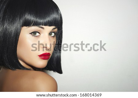 Beautiful Brunette young Woman. Healthy Black Hair. bob Haircut. red lips. beauty Girl. Sexy