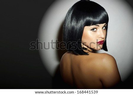 Beautiful Brunette young Woman. Retro style. Healthy Black Hair. bob Haircut. red lips. beauty Girl. Sexy