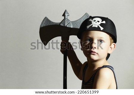 little barbarian.Boy in Carnival Costume.Angry warrior.Fashion Kids. Masquerade.Unusual Uniform.Pirate Child.Halloween