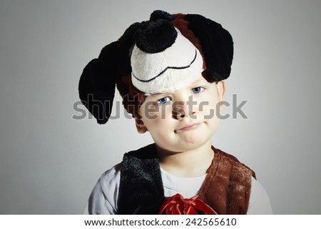 funny little Boy in Carnival Costume.Dog.Fashion Kids. Masquerade.Unusual Uniform.Child.Halloween