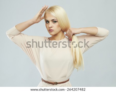 A Strong Athletic Woman On Black Background Wearing In White